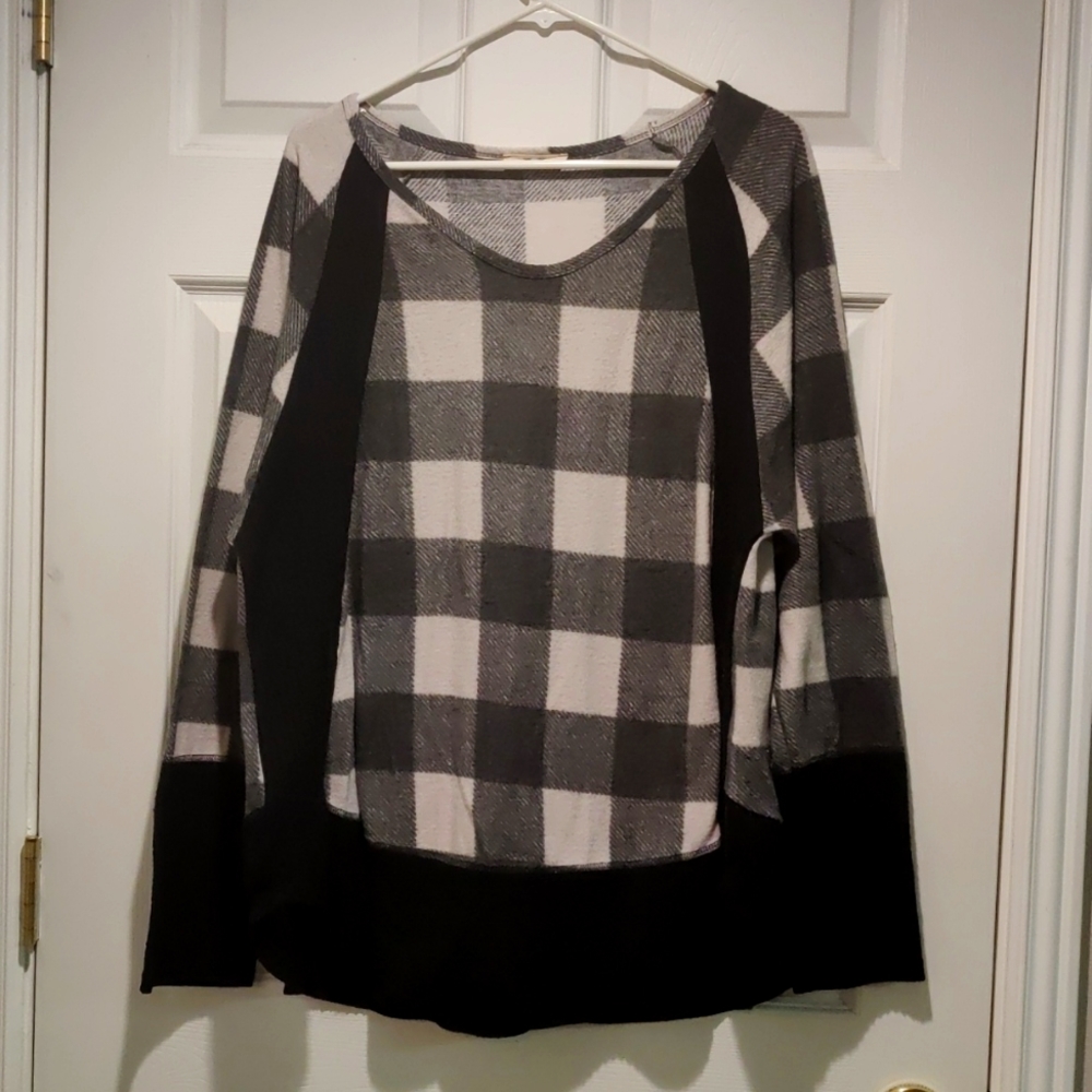 Black and white buffalo plaid top.